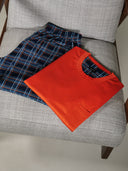 Short-sleeved men’s pajama, in lightweight pure mercerized cotton with orange pattern