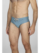 Slip mare uomo fantasia micro geometrica verde